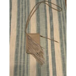 Adorable Hobo phone carrying case with card slots inside and cute fringe detail